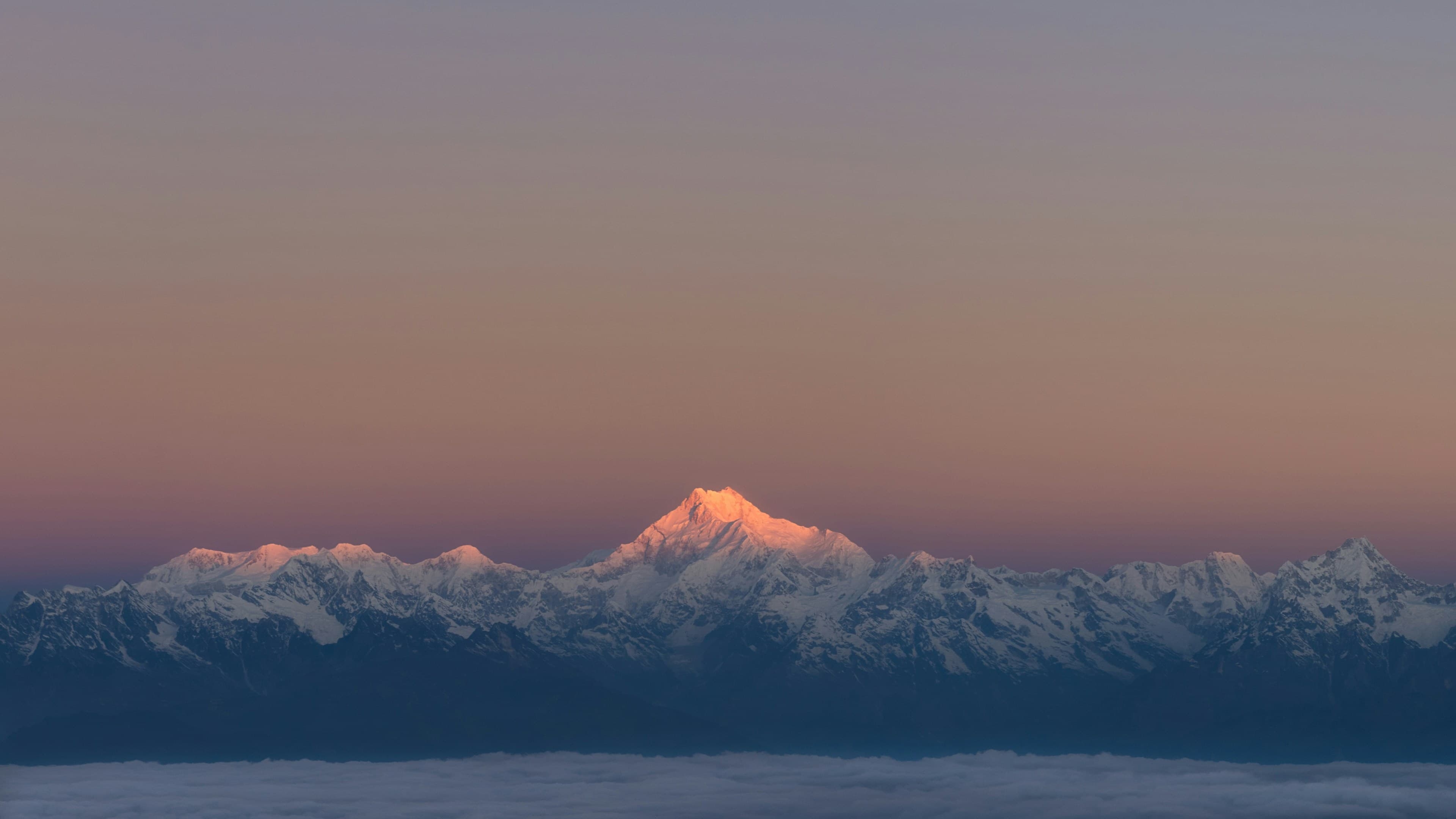 Tourist packing essentials for a Sikkim trip including warm clothes, trekking shoes, travel documents, and accessories